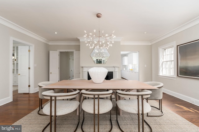 dining room featuring crown molding, dark hardwood / wood-style floors, and a chandelier