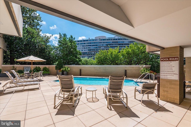 view of pool with a patio