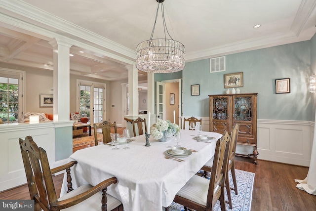 dining area with ornamental molding, coffered ceiling, and ornate columns