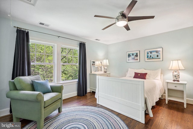 bedroom featuring dark hardwood / wood-style flooring and ceiling fan