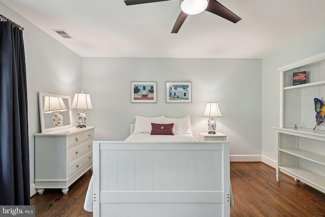 bedroom featuring ceiling fan and dark hardwood / wood-style flooring