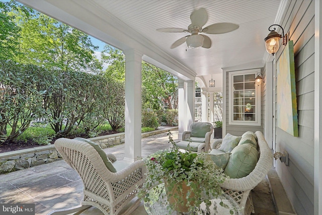 view of patio / terrace featuring ceiling fan