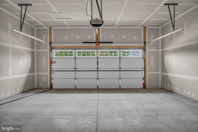 garage featuring a garage door opener