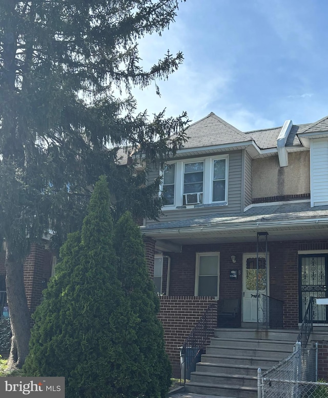 view of front of home featuring cooling unit