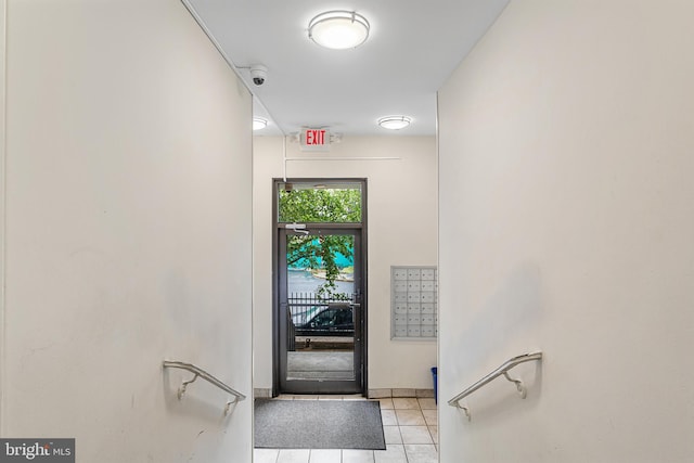 entryway with light tile floors