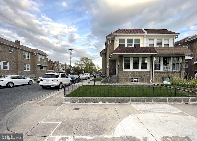 view of front of home with a front lawn