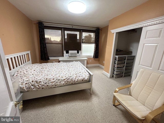 bedroom with carpet and radiator heating unit