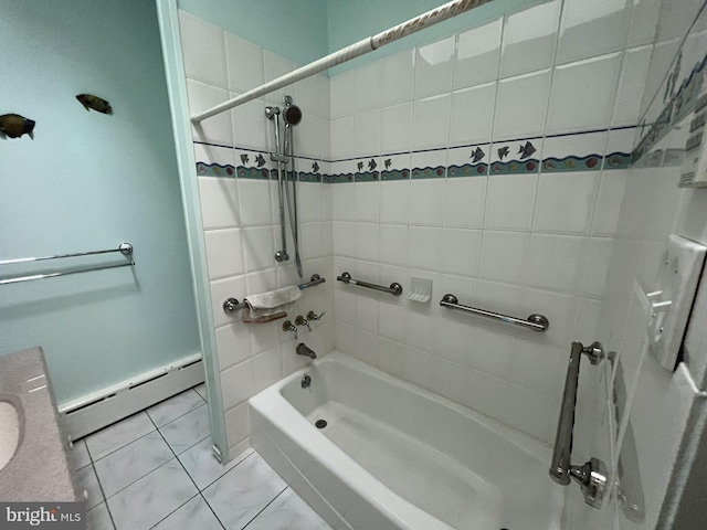 bathroom featuring tile flooring, vanity, tiled shower / bath, and a baseboard heating unit