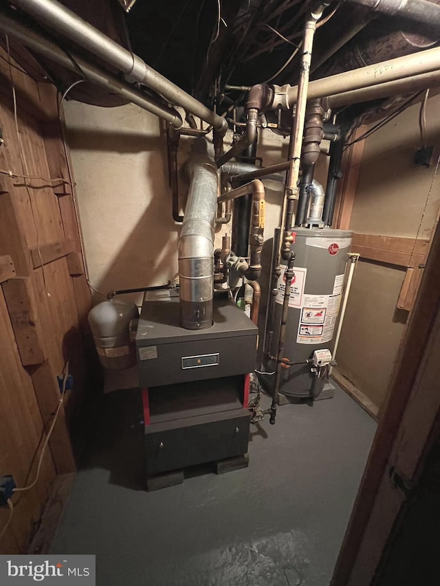 utility room with water heater