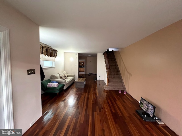 living room featuring dark hardwood / wood-style floors