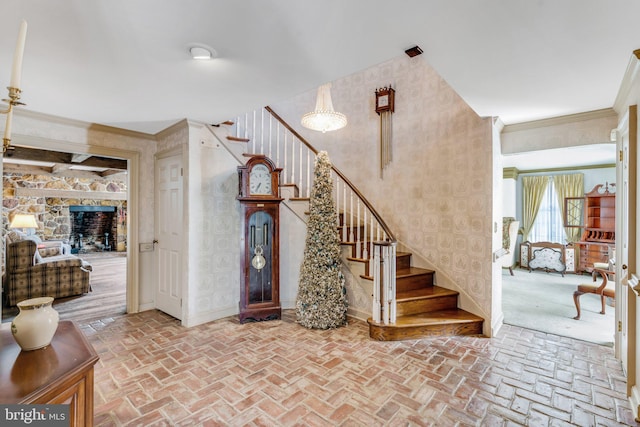 entryway with a stone fireplace