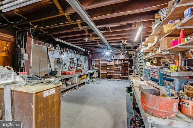 basement with a workshop area