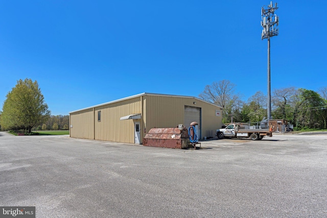 view of outdoor structure featuring a garage