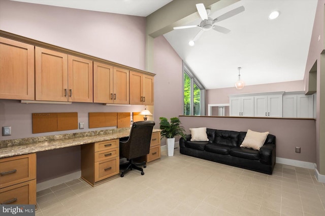 tiled office featuring high vaulted ceiling, ceiling fan, and built in desk