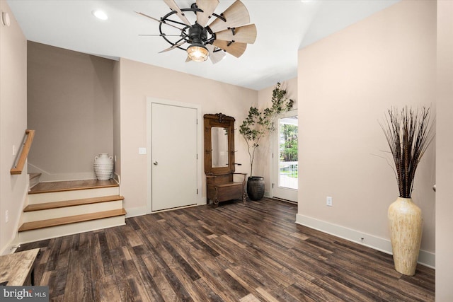 entrance foyer featuring ceiling fan and dark wood-type flooring