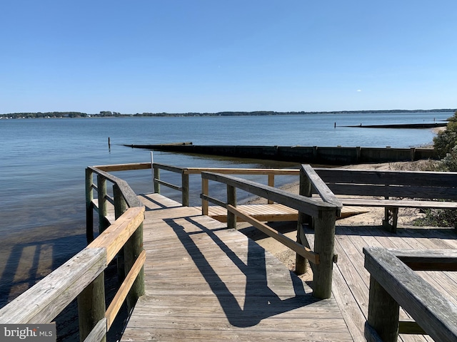 dock area featuring a water view