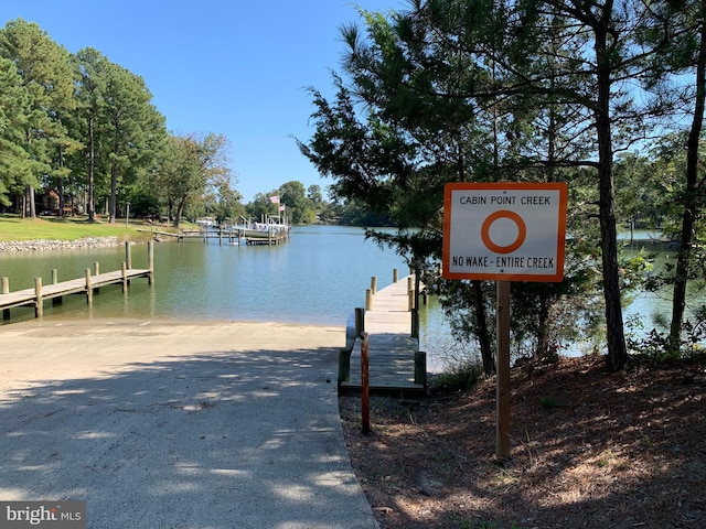 view of dock with a water view