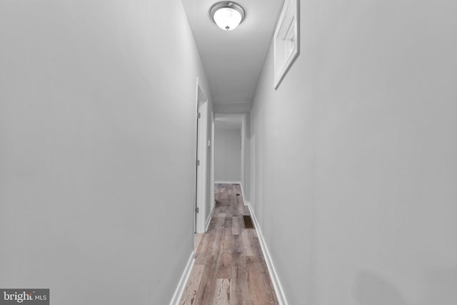 corridor featuring light wood-type flooring