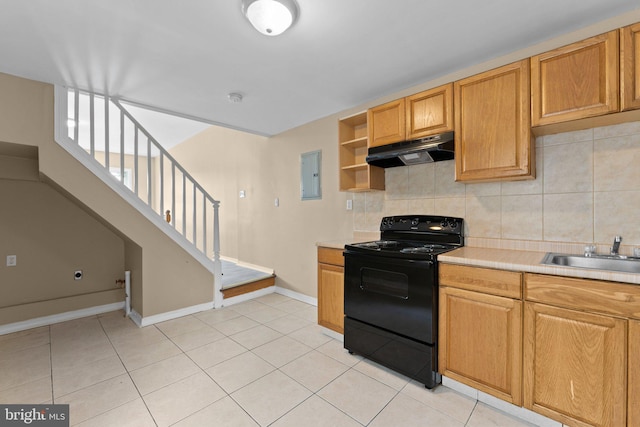 kitchen featuring sink, black electric range oven, backsplash, electric panel, and light tile patterned floors