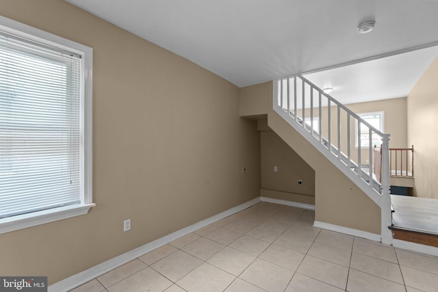 interior space with light tile patterned floors