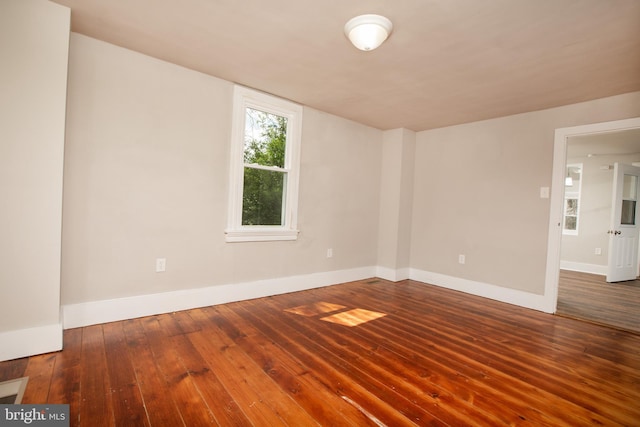 empty room featuring hardwood / wood-style flooring