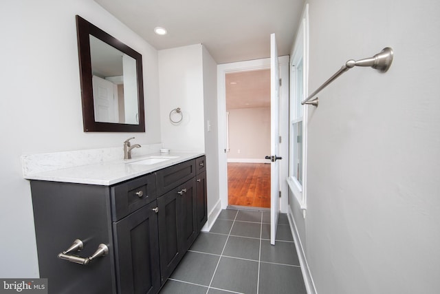 bathroom featuring vanity and tile flooring