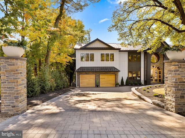 view of front of home featuring a garage