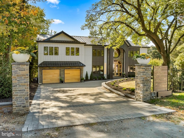 view of front of home with a garage