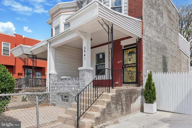 entrance to property with a porch