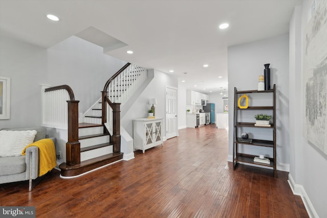 entrance foyer featuring hardwood / wood-style flooring