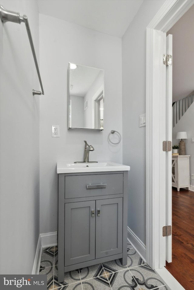 bathroom featuring hardwood / wood-style floors and vanity