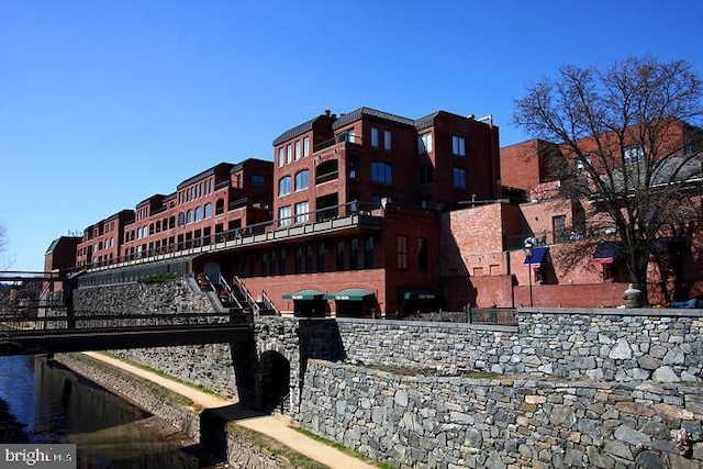 view of building exterior featuring a water view