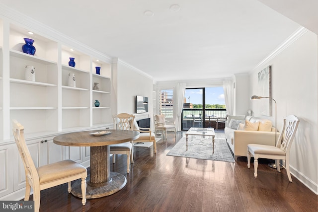 interior space with dark wood-type flooring, built in shelves, and crown molding