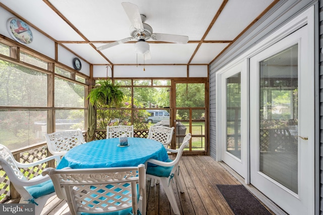 sunroom featuring plenty of natural light and ceiling fan