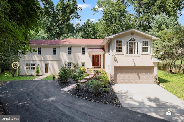 view of front of property featuring a garage