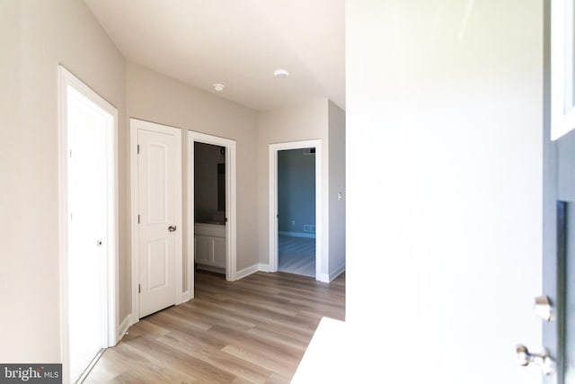 hall featuring light hardwood / wood-style floors