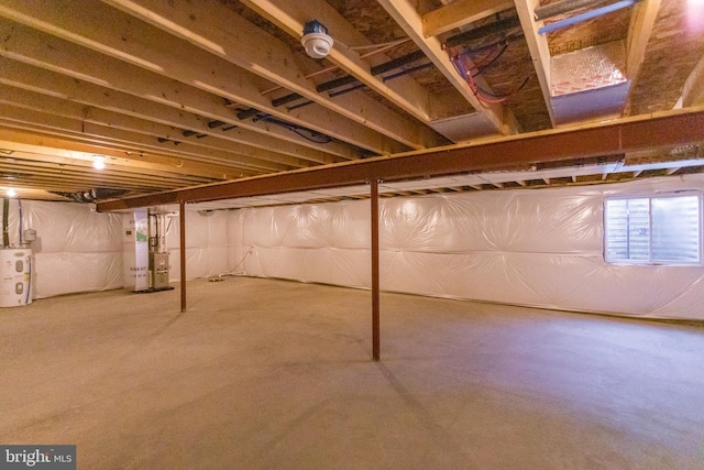 basement with heating unit and water heater