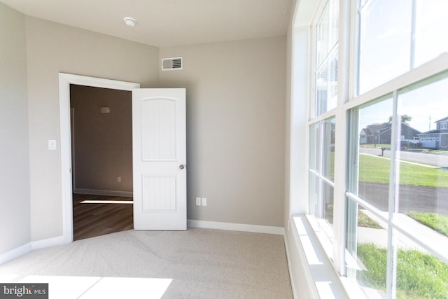 view of carpeted spare room