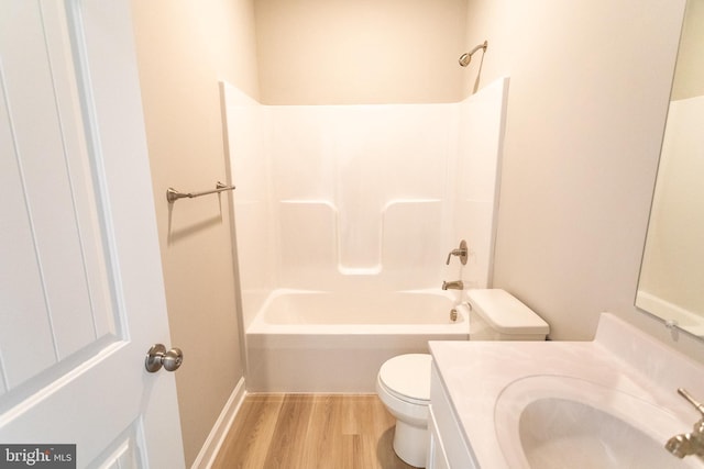 full bathroom with vanity, shower / bathtub combination, toilet, and wood-type flooring