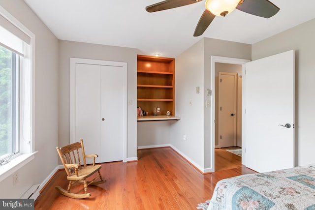 409 Hilltop Rd, Strasburg, PA 17579 - bedroom featuring hardwood / wood-style flooring, ceiling fan, and a closet