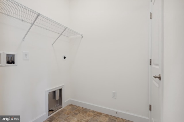 clothes washing area with washer hookup and hookup for an electric dryer