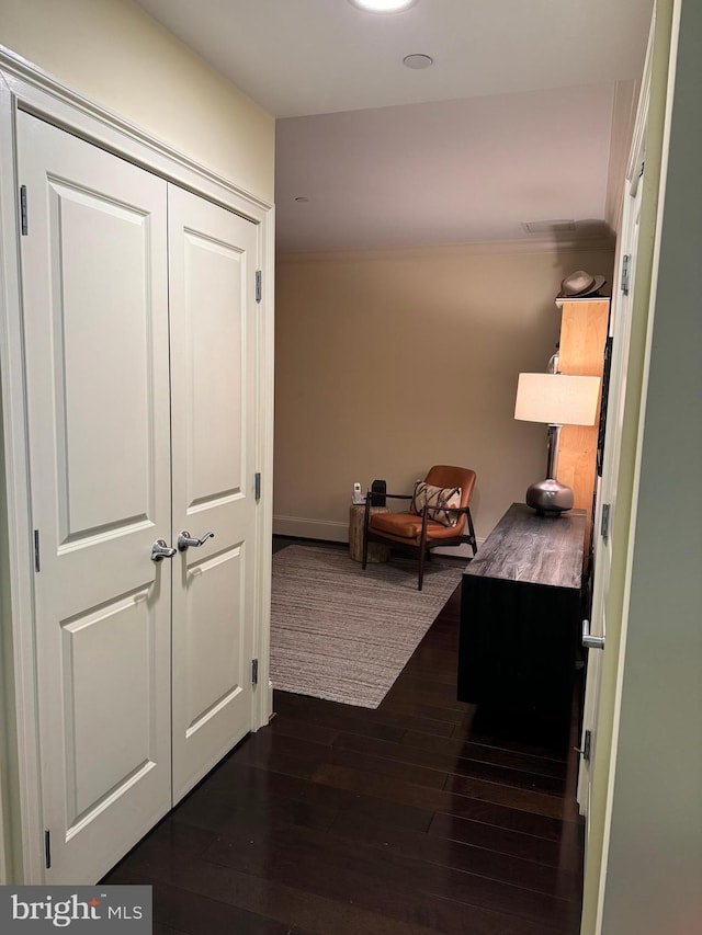 corridor with dark wood-type flooring