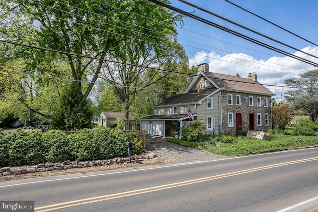 view of front of property featuring a garage