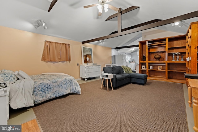 bedroom featuring vaulted ceiling with beams, ceiling fan, and hardwood / wood-style floors