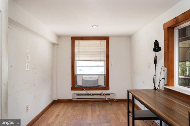 interior space featuring light hardwood / wood-style flooring and a baseboard radiator