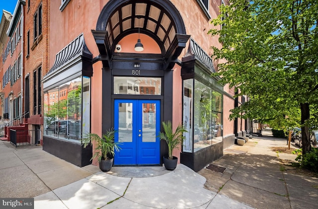 entrance to property featuring french doors