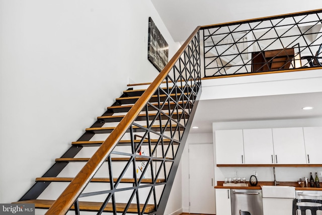 stairs featuring sink