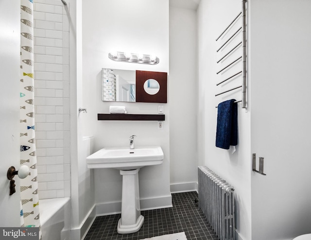 bathroom featuring shower / bath combo with shower curtain, tile floors, and radiator heating unit