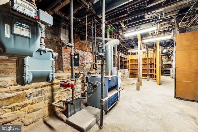 basement with brick wall