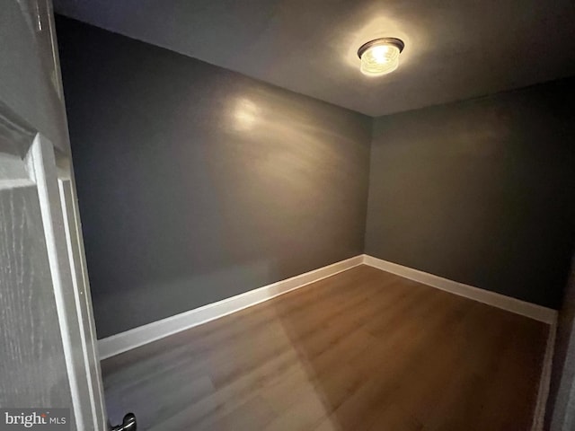 empty room featuring wood-type flooring